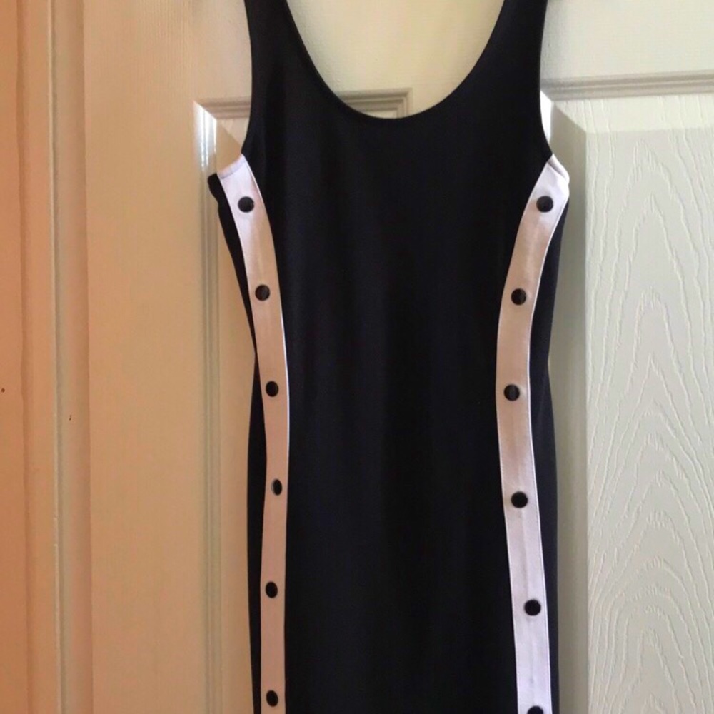 Mini dress with buttons on the side